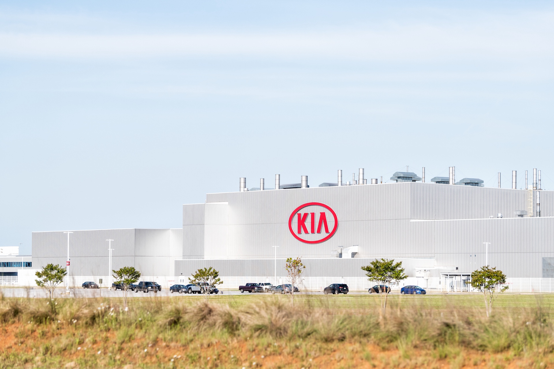 Modern Kia Motors Manufacturing plant, factory, production, assembly facility in Georgia with sign, logo, cars