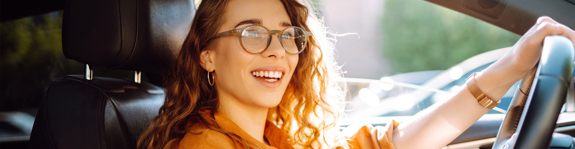 First Time Buyer driving her car