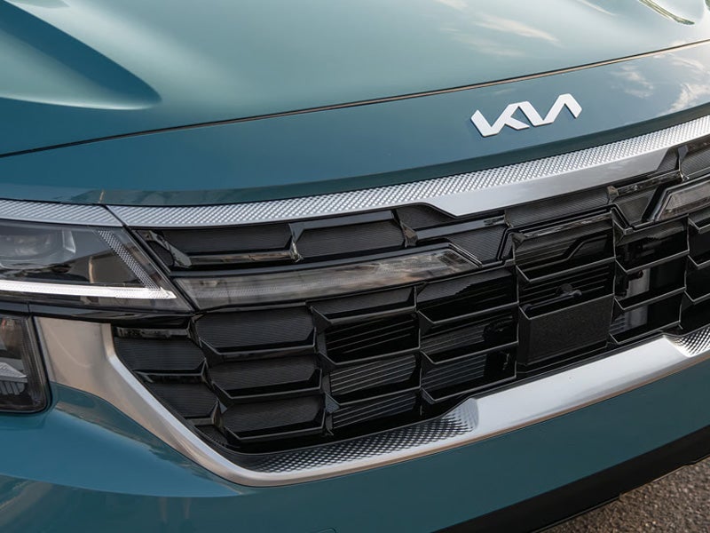Teal Kia SUV